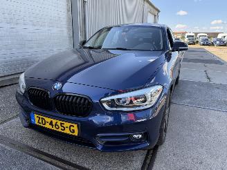 skadebil auto BMW 1-serie 118i Sport Line Automaat 2019/4