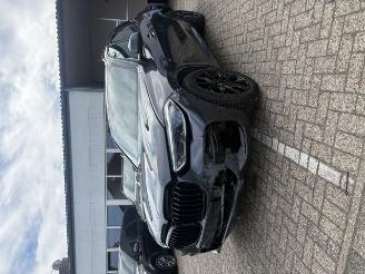 skadebil auto BMW X5 45e M Sport xDrive*Panorama*Laserlicht*HeadUp*Ambiente*HarmanKardon*DisplayKey*Luchtvering*Stoel/Leer/Verwarming/Memory* 2021/3