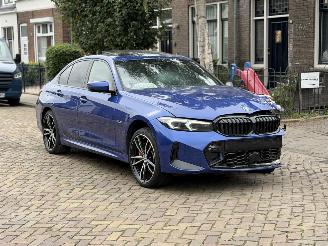 krockskadad bil auto BMW 3-serie 330e M PAKKET X-Drive 2023/1