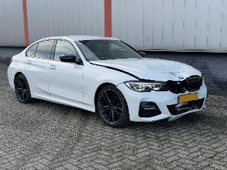 Schadeauto BMW 3-serie 318i M PAKKET AUTOMAAT 2020/1