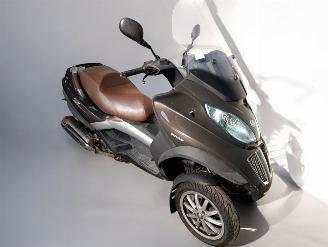 skadebil bromfiets Piaggio  MP3 2013/1