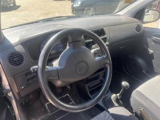 Daihatsu Cuore Cuore (L251/271/276), Hatchback, 2003 1.0 12V DVVT picture 4