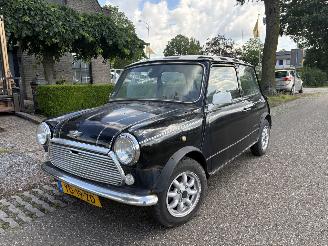 krockskadad bil auto Mini 1000 U9 OPKNAPPER 1990/3